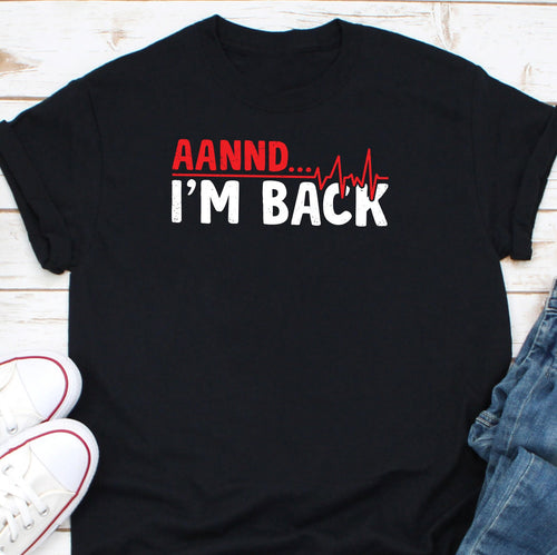 a black t - shirt with the words i'm back printed on it