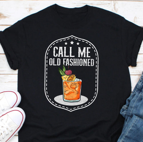 a black t - shirt that says call me old fashioned