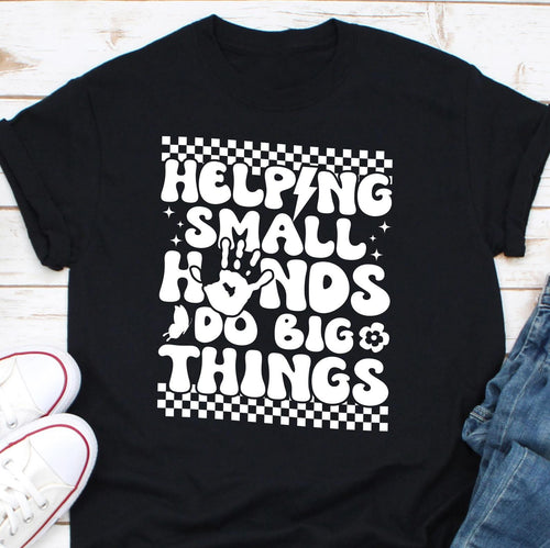 a t - shirt that says helping small hands do big things