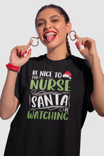 Load image into Gallery viewer, Be Nice To The Nurse Santa Is Watching Shirt, Christmas Santa Nurse Shirt, RN Nurse T-shirt

