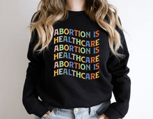 Load image into Gallery viewer, Abortion Is Healthcare Hoodie, Abortion Rights Sweatshirt, Protest Shirt, Women&#39;s Rights Shirt
