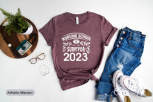 Load image into Gallery viewer, Nursing School Survivor 2023 Shirt, Nurse Graduation Shirt, Nursing Degree Shirt, Nursing Student
