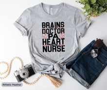 Load image into Gallery viewer, Brains Of Doctor Pa Heart Of A Nurse Shirt, Nurse Week Shirt, Nurse Life Shirt, Nursing Shirt
