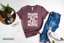 Load image into Gallery viewer, Brains Of Doctor Pa Heart Of A Nurse Shirt, Nurse Week Shirt, Nurse Life Shirt, Nursing Shirt
