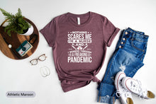 Load image into Gallery viewer, Nothing Scares Me I&#39;m A Nurse And I Worked Through A Freaking Pandemic Shirt, Nursing Shirt, Nurse Life Shirt
