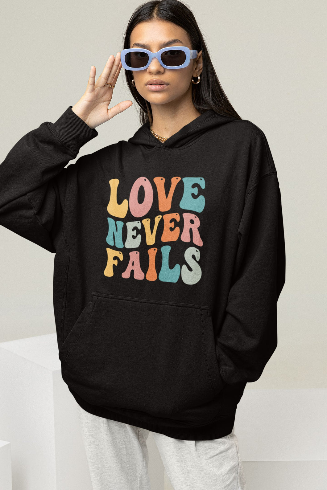 Love Never Fails Hoodie & Sweatshirt